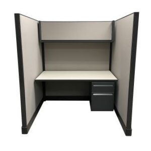 Office cubicle workstation with tall fabric privacy panels, overhead storage shelf, desktop surface, and two-drawer pedestal
