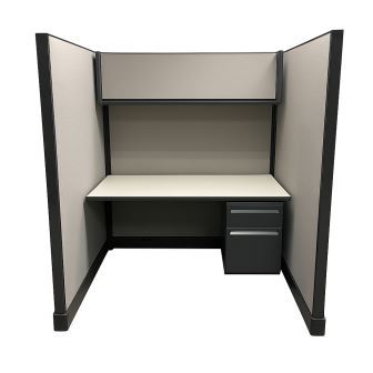 Office cubicle workstation with tall fabric privacy panels, overhead storage shelf, desktop surface, and two-drawer pedestal